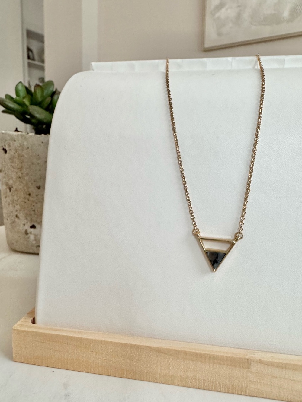 Gold Triangle Pendant Necklace with Black Stone
